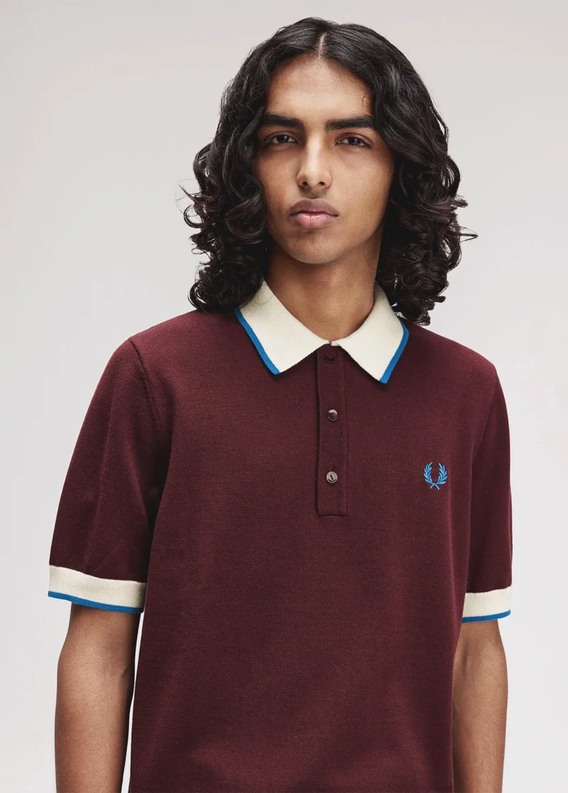 New Releases: Male wearing a Fred Perry Contrast Tipped Knitted Shirt in Oxblood