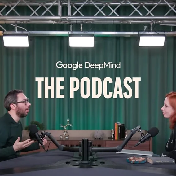 Two people are seated at a table with microphones. Above, text reads “Google DeepMind: The Podcast.”