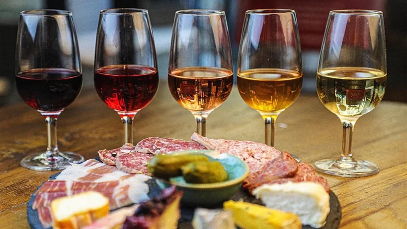 Image description: Wine and charcuterie at Vino al Vino, in Florence.