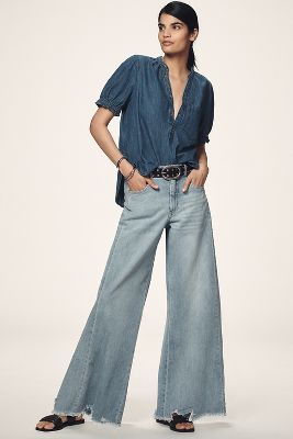 The Adi Regenerative Cotton Mid-Rise Frayed Relaxed Flare Jeans by Pilcro