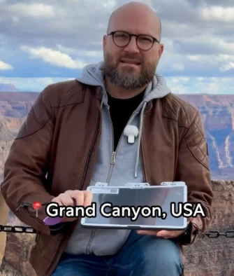 Image of Jan holding and iPad at the Grand Canyon.
