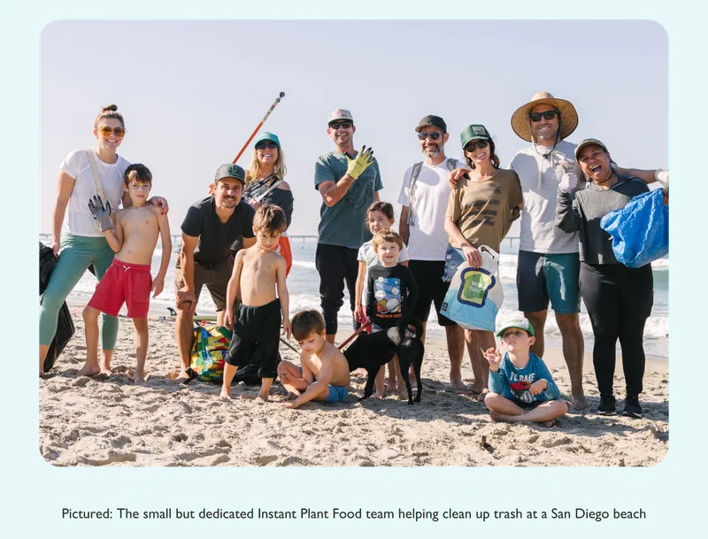 The small but dedicated Instant Plant Food team helping clean up trash at a San Diego beach