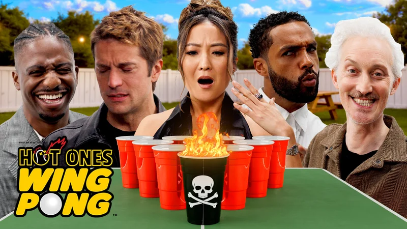 Emily in Paris cast on Hot Ones Wing Pong.
