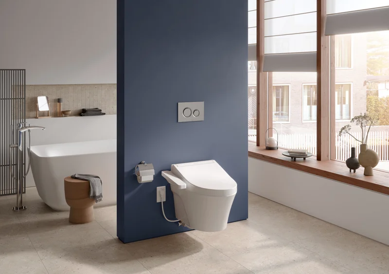 A TOTO WASHLET C2 bidet seat in an elegant sunny bathroom