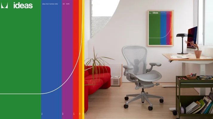 Graphic of an archival Ideas magazine cover with receding stripes of green, blue, purple, red, orange, and yellow on the left next to an image of a private office setting with an Aeron Chair in mineral finish at Jarvis Bamboo Standing Desk, OE1 Trolley in green, and the same Ideas magazine cover as a poster hanging on the back wall.