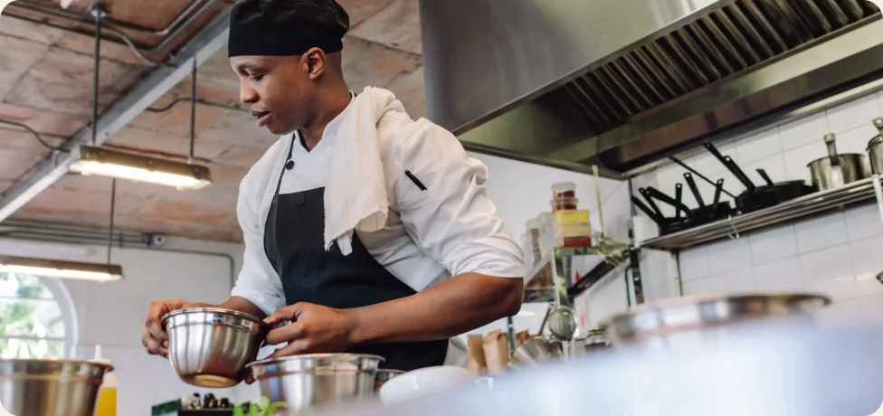 Chef food prepping in a kitchen