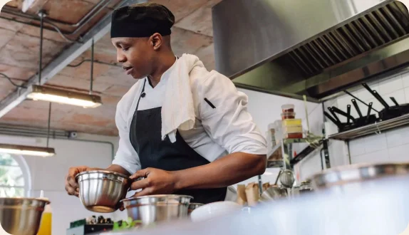 Chef food prepping in a kitchen