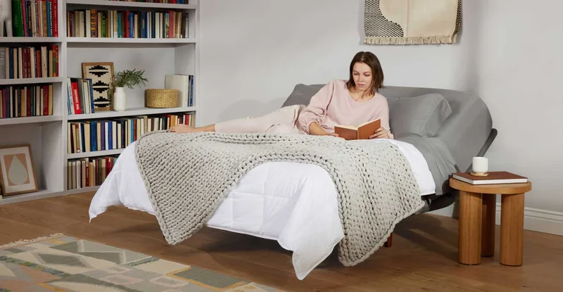 Women resting on bed while reading