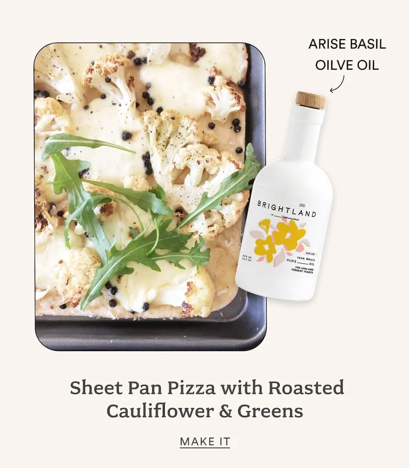 Sheet Pan Pizza with Roasted Caultiflower and greens. Made with Arise Basil Oil