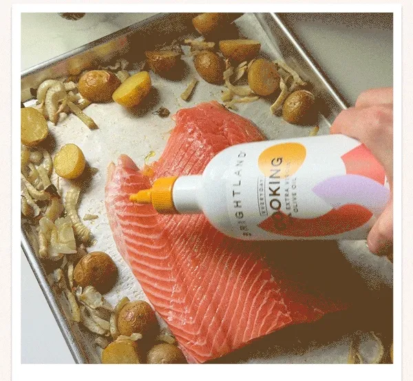 A video of Everyday Cooking Oil being drizzled over salmon