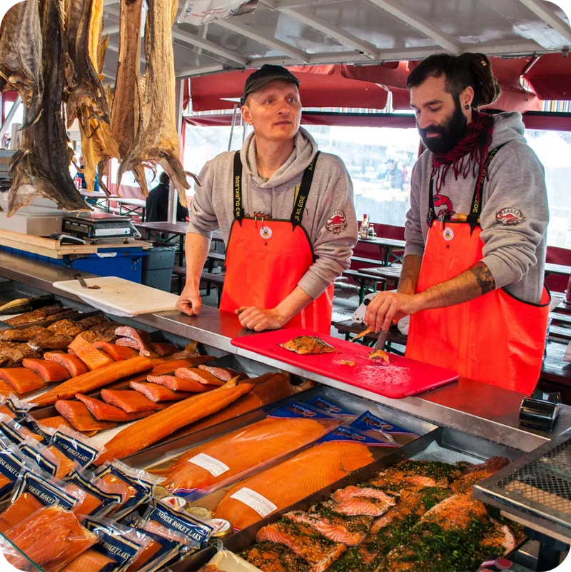 Men working at a fish market.