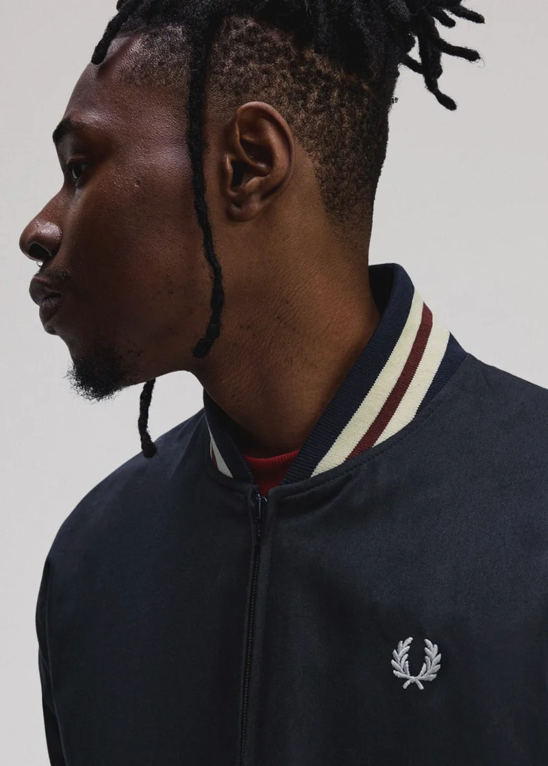 Only At Fred Perry: our exclusive pieces you can't buy from anywhere else.