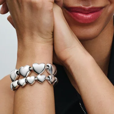 Snake chains loaded with heart charms
