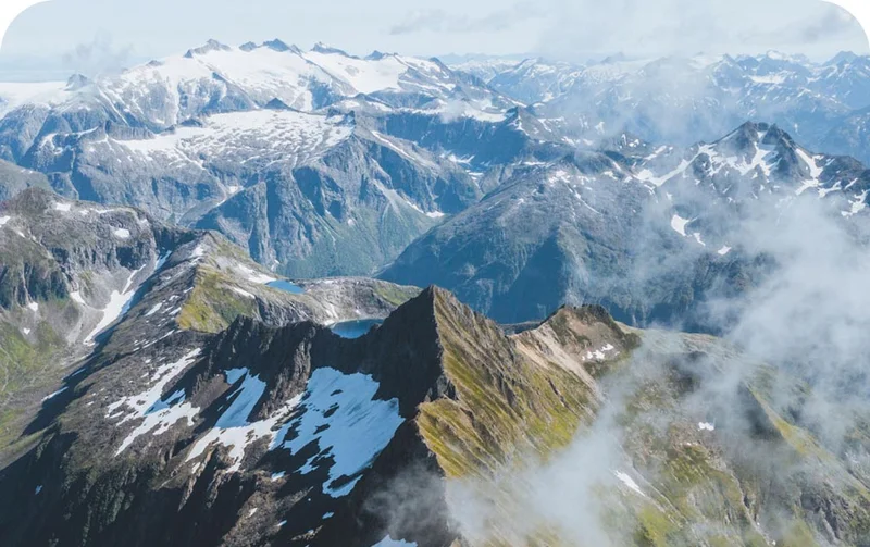 Patagonia Stories. An aerial view of snowcapped mountains.