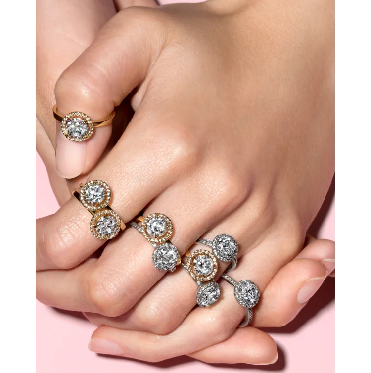 Hands wearing Pandora jewelry