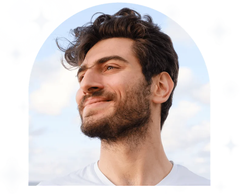 Man looking away portrait at sunset