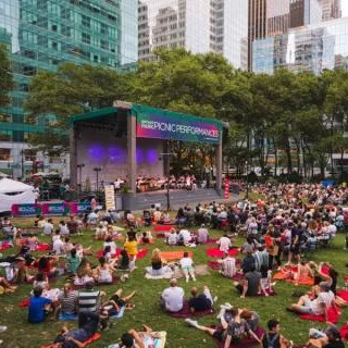people having a picnic in bryants park with music