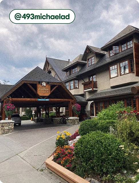 Image description: The exterior and porte cochere of the Banff Caribou Lodge, photo taken by @493michaelad