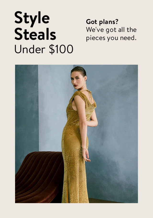 A woman wearing a gold gown.