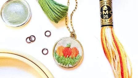 Crafting a Pumpkin Pendant: The Art of Hand Embroidered Jewelry