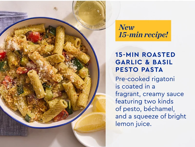 New 15 Min Meal | 15 Min Roasted Garlic & Basil Pesto Pasta - Pre-cooked rigatoni is coated in fragrant, creamy sauce featuring two kinds of pesto, bechamel, and a squeeze of bright lemon juice.
