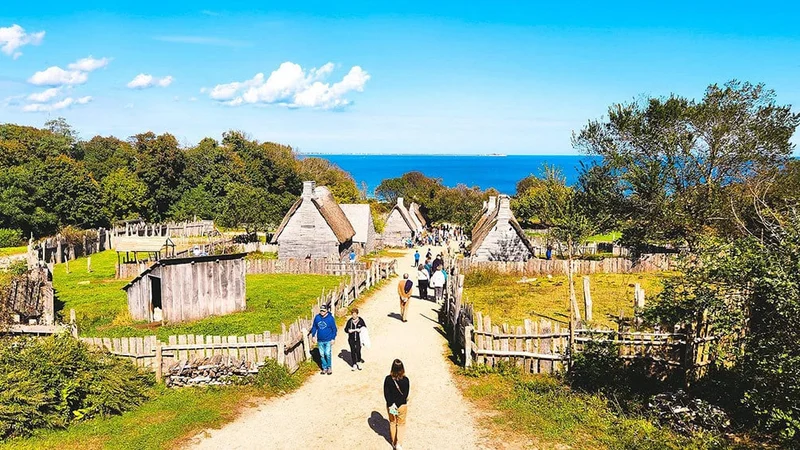Image description: Visitors at the Plimoth Patuxet Museums.