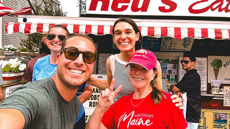 Image description: Group of friends outside of Red’s Eats in Southern Maine.