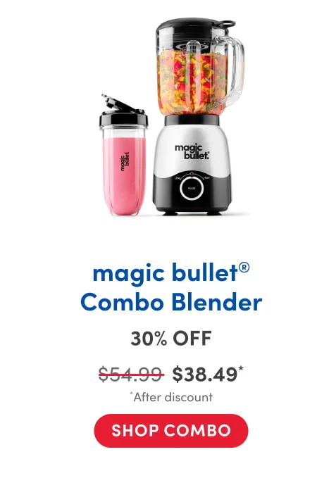 A magic bullet blender set on a white background, featuring the main blender base with a large pitcher filled with chopped vegetables and a separate travel cup filled with a pink smoothie, both displaying the "magic bullet" logo. The pitcher has a handle and lid, and the cup includes a drinking lid.