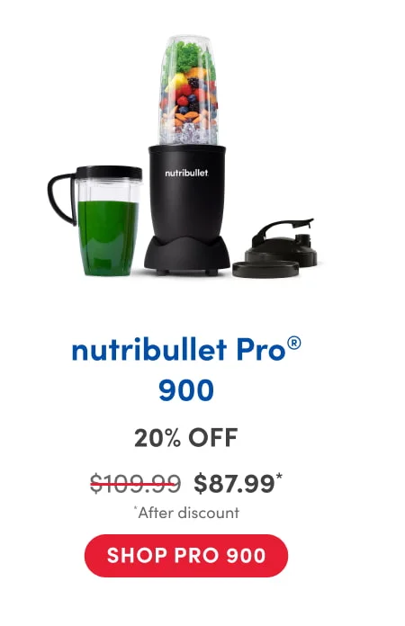A nutribullet blender filled with fruits, vegetables, nuts, and ice, alongside a cup of green smoothie, a handled lid, and a to-go lid, all set against a white background.