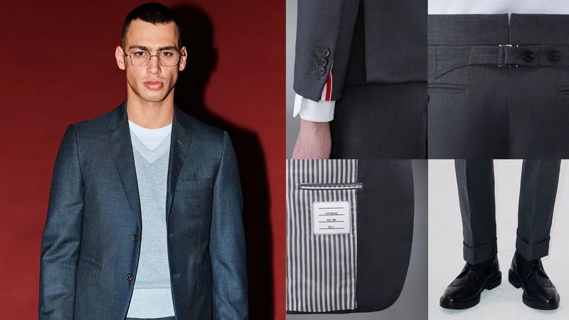 A model wearing the Thom Browne classic-fit gray suit.