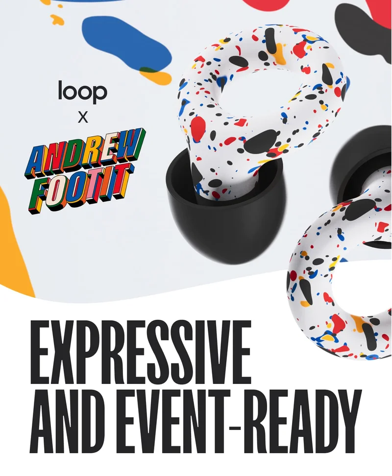 Woman wearing the colorful new Loop x Andrew Footit Experience earplugs against a background with the same vibrant red, blue and yellow colors.