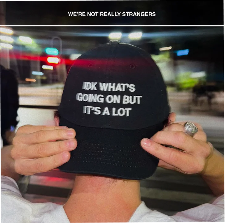 Person wearing the Idk What's Going On But It's A Lot Dat Hat