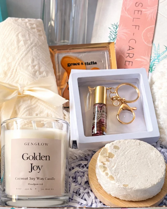 Genglow self-care box with Golden Joy candle and bath treats