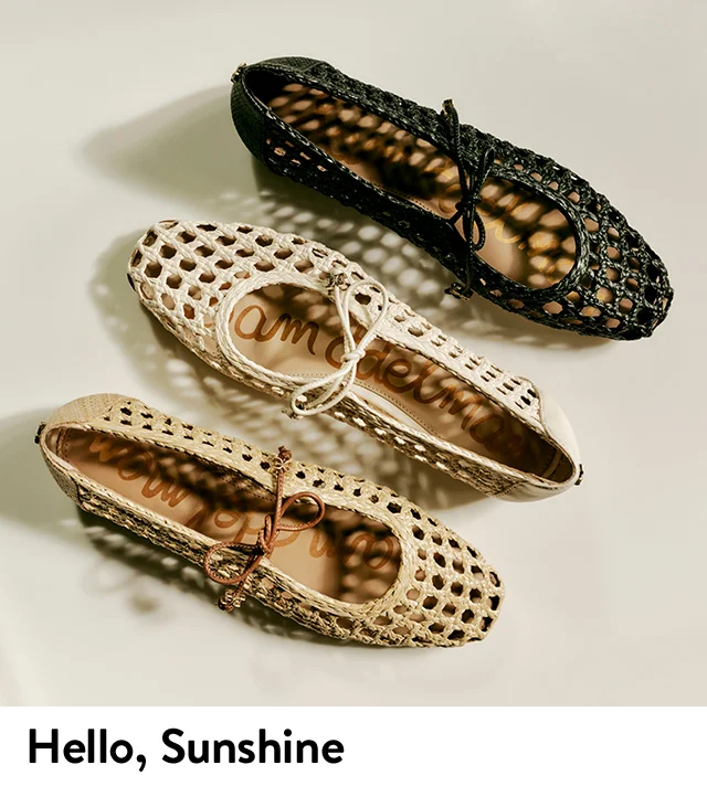 Woven ballet flats in black, cream and tan.