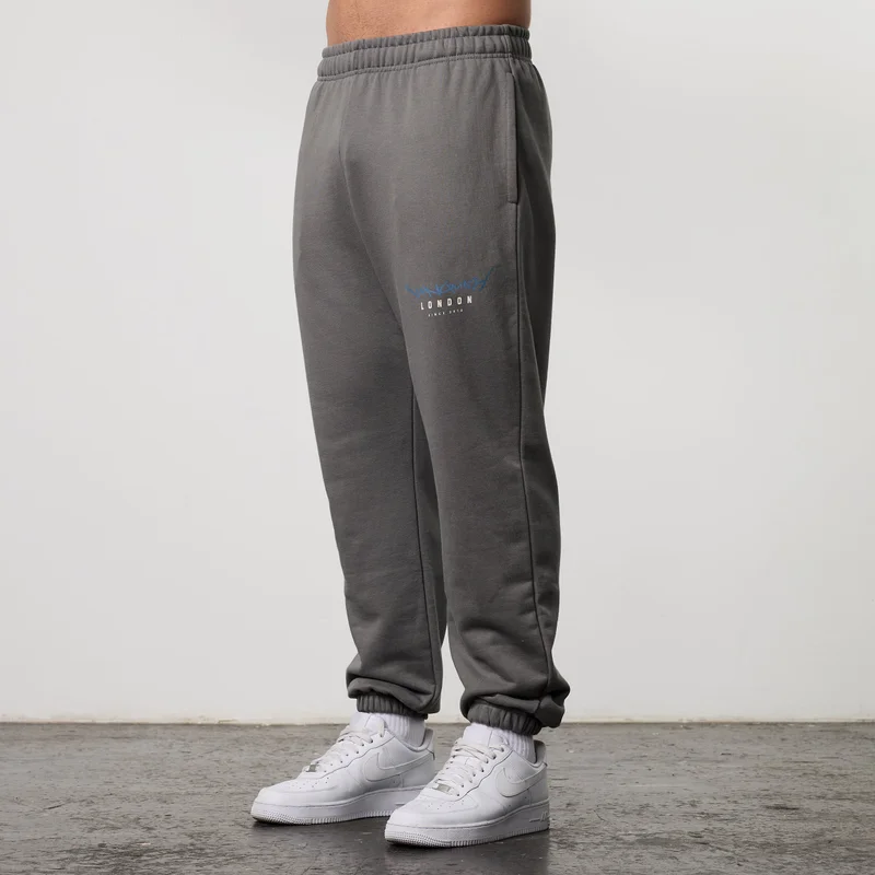 Image of GRAFFITI GREY OVERSIZED SWEATPANTS