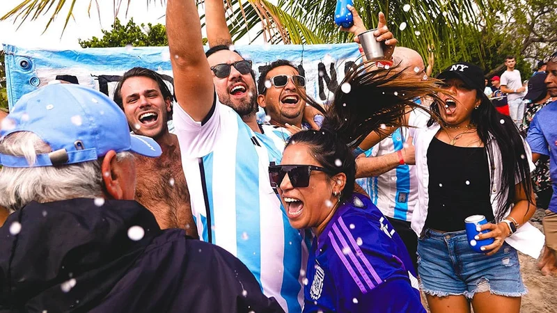 Image description: Soccer fans celebrating in Miami.