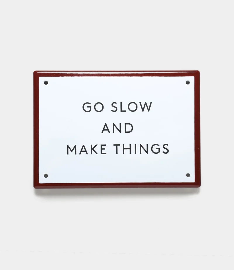 Image of “Go Slow” Enamel Steel Sign