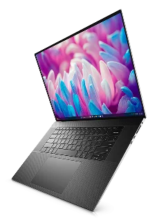 A Dell laptop computer suspended in midair.