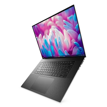 A Dell laptop computer suspended in midair.