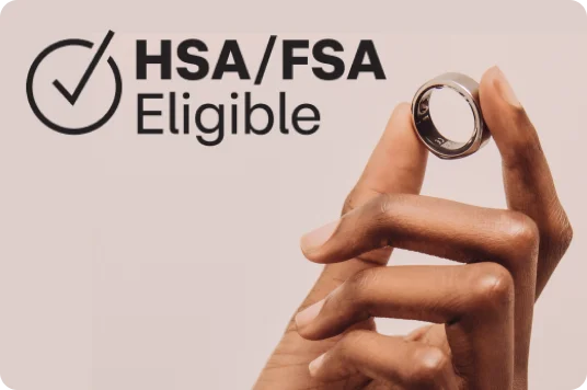 Person holding Oura ring