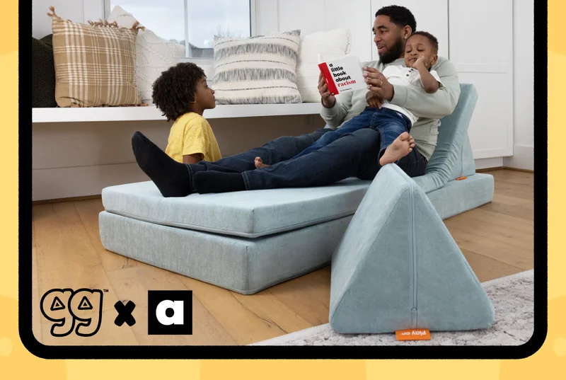 Image of a father and children reading A Kids Co. book