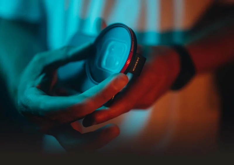 Image of someone installing a filter on a 67mm universal filter mount.