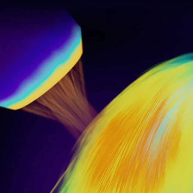 Thermal image of a model drying her hair with the Dyson Supersonic hair dryer