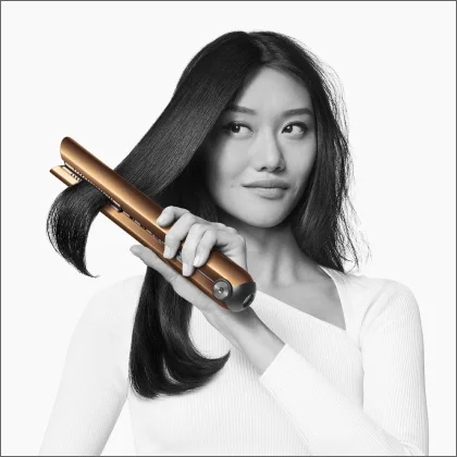 Model using Dyson Corrale straightener
