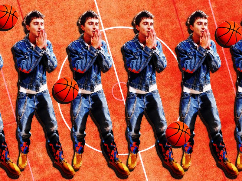 Image may contain: Timothée Chalamet, Timothée Chalamet, Clothing, Pants, Ball, Basketball, Basketball (Ball), and Sport