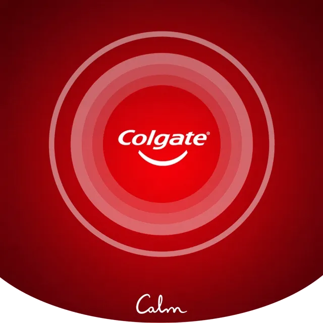 Colgate logo centered over soft, pulsating circles on a red background. Below it, the text reads ‘share gratitude,’ with the Calm logo beneath.
