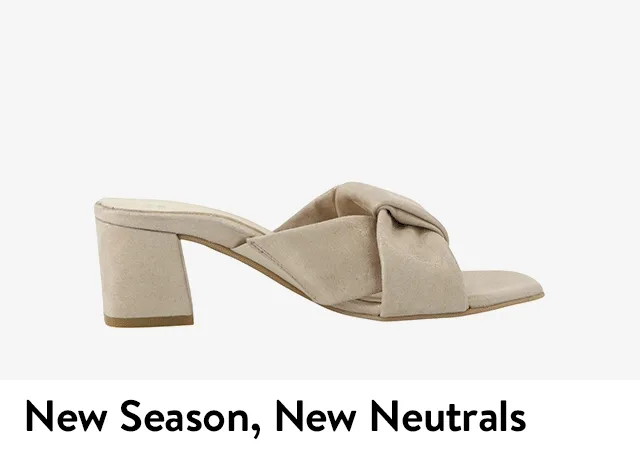 A beige slide sandal, white mary jane, tan loafer and tan ankle-strap sandal.