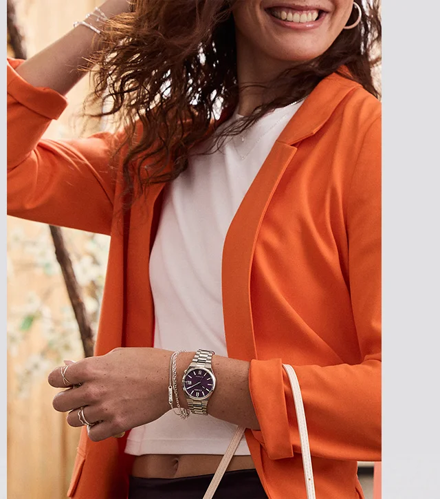 Woman wearing the purple dial TSUYOSA