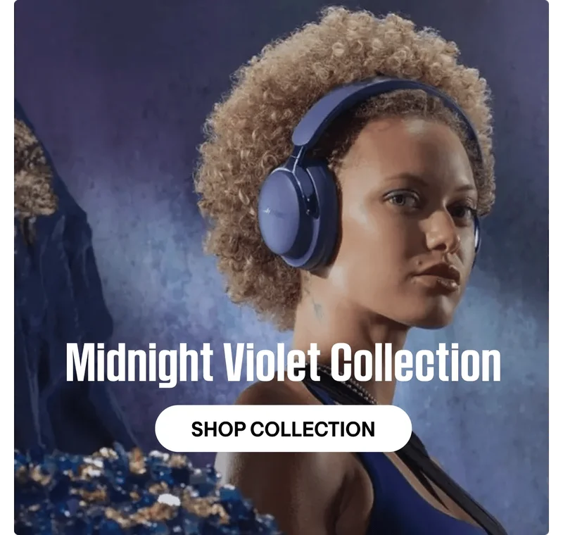 Woman wearing QuietComfort Ultra Headphones (2nd Gen) in Midnight Violet