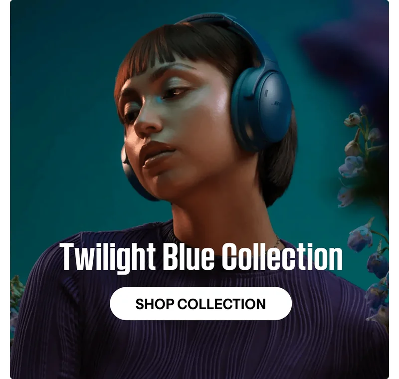 Woman wearing QuietComfort Headphones in Twilight Blue.